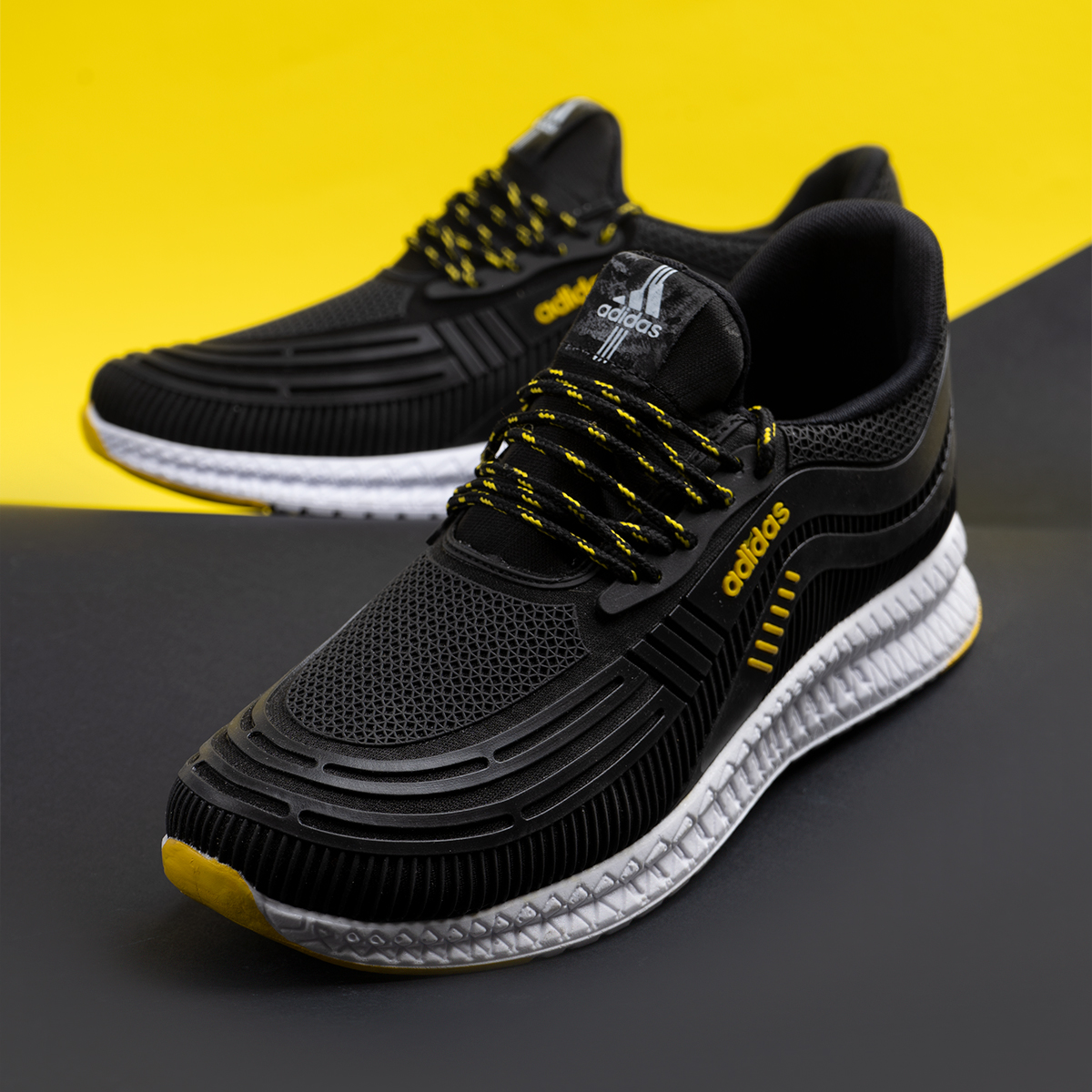کفش ورزشی Adidas مردانه مشکی زرد مدل Pardad
