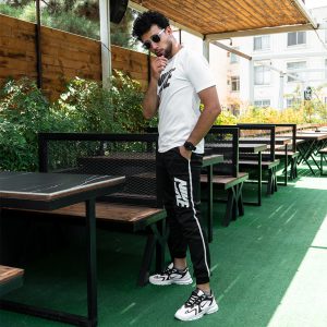پکیج ست تیشرت شلوار Nike مردانه مدل B900کفش ورزشی سفید مشکی مردانه Nike مدل Bevis