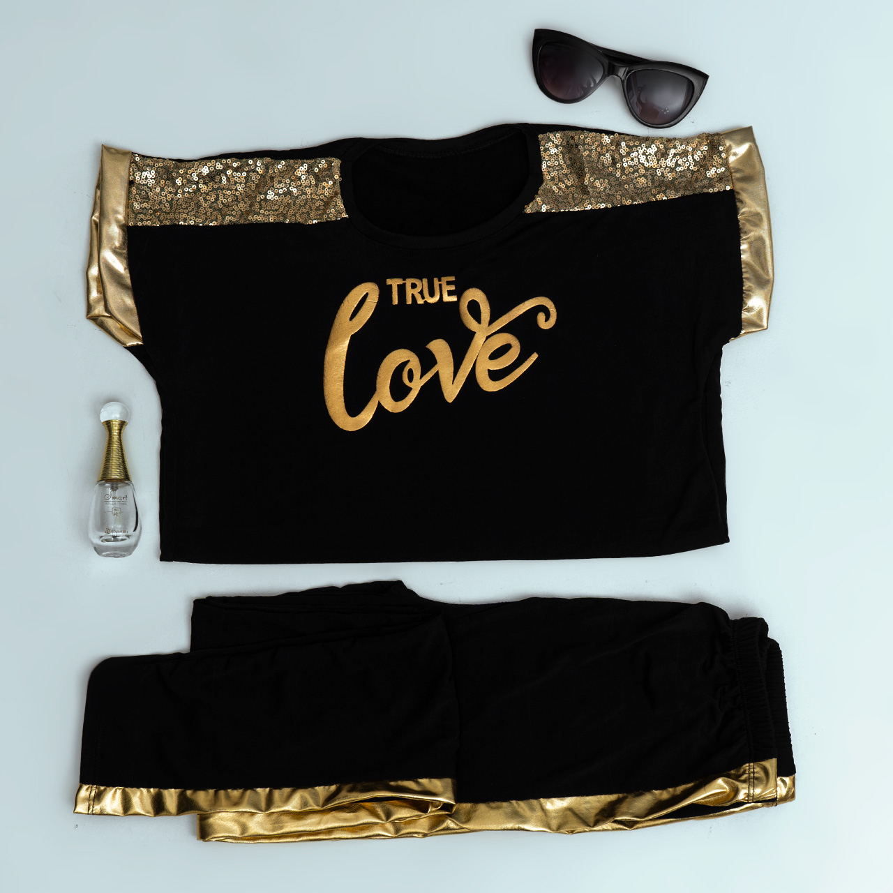 ست تیشرت شلوار love زنانه طلایی مدل Raha