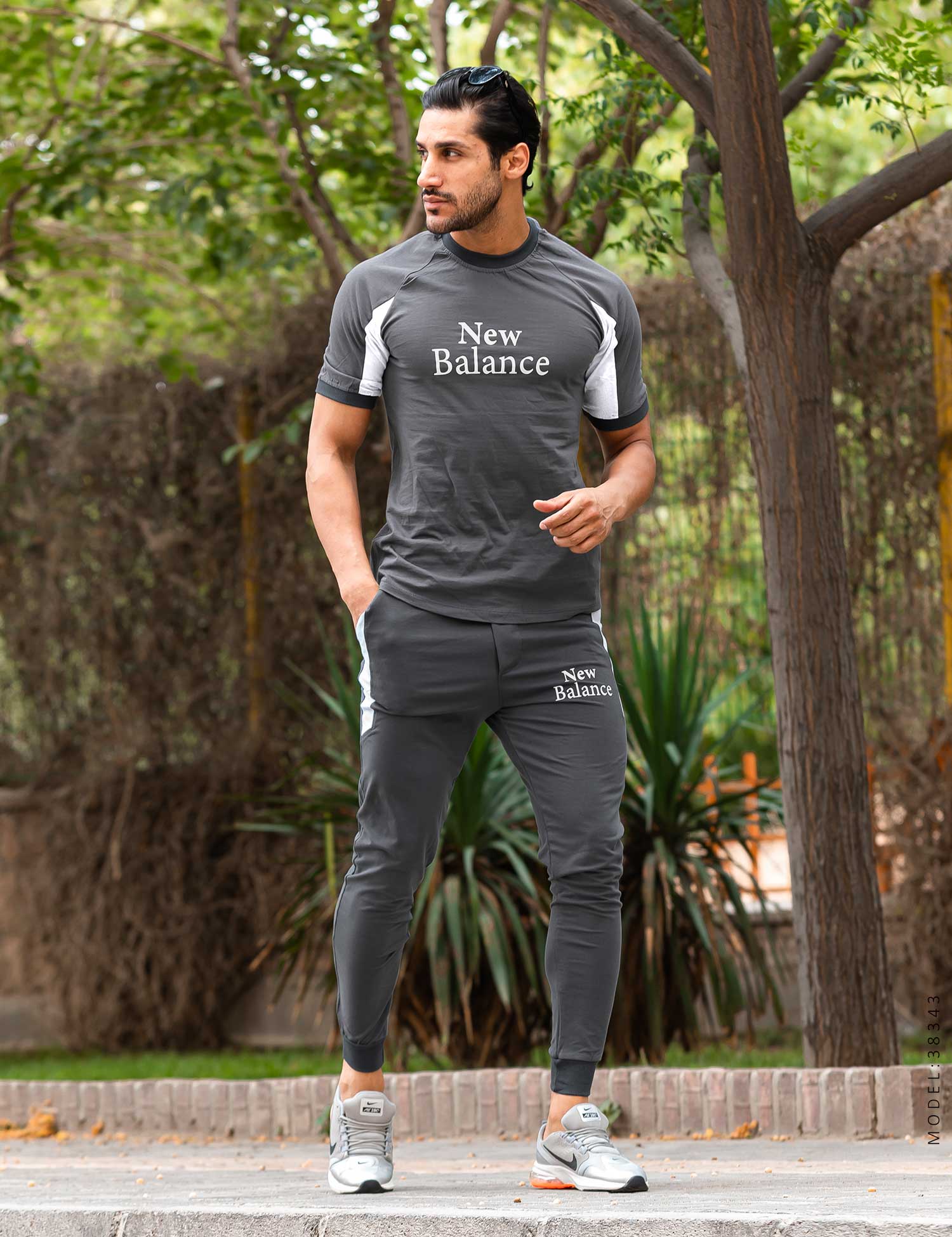ست تیشرت شلوار مردانه New Balance مدل 38343