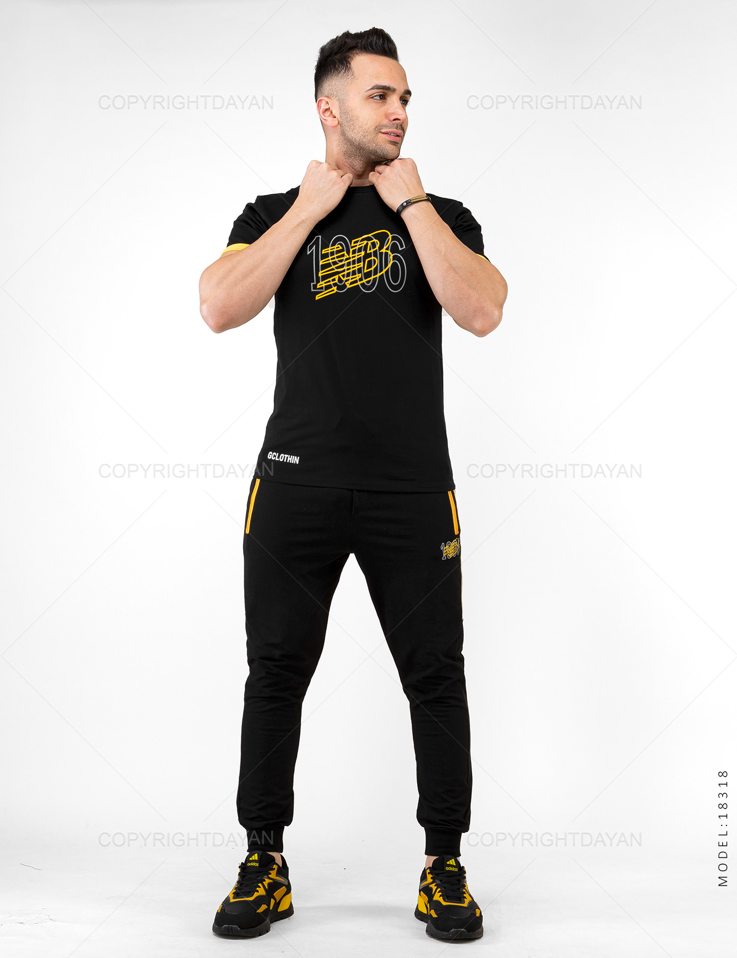 ست تیشرت شلوار مردانه New Balance مدل 18318
