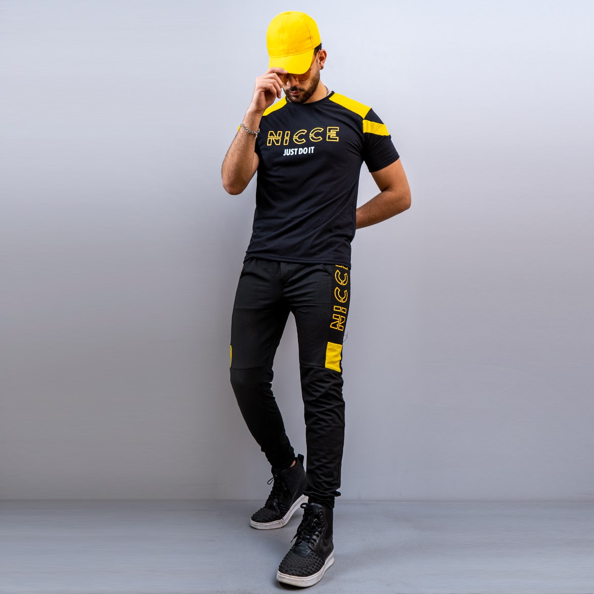 ست تیشرت شلوار مردانه NICCE زرد مشکی