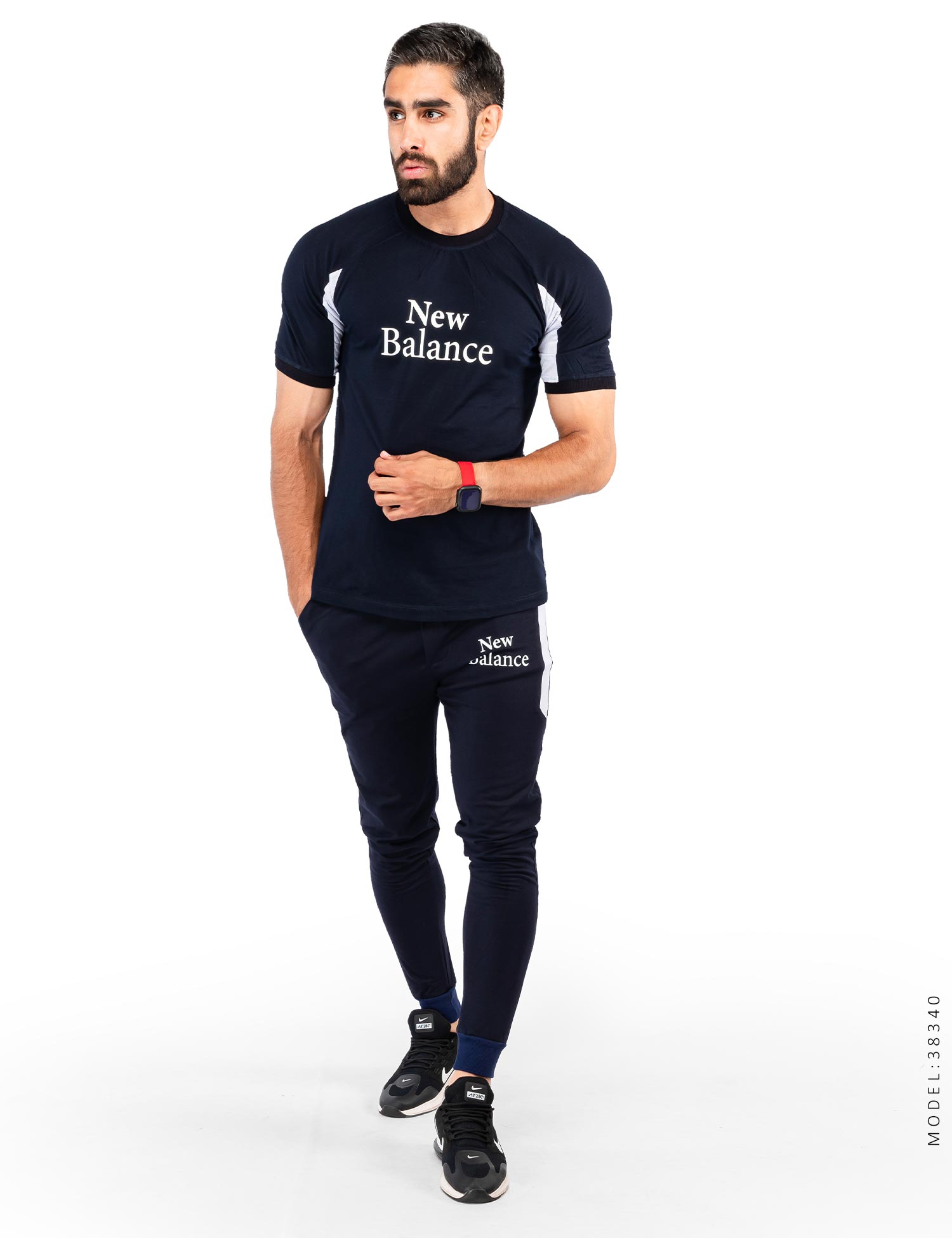 ست تیشرت شلوار مردانه New Balance مدل 38340