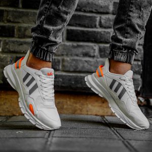 کفش ورزشی Adidas مردانه سفیدنارنجی مدل Levin