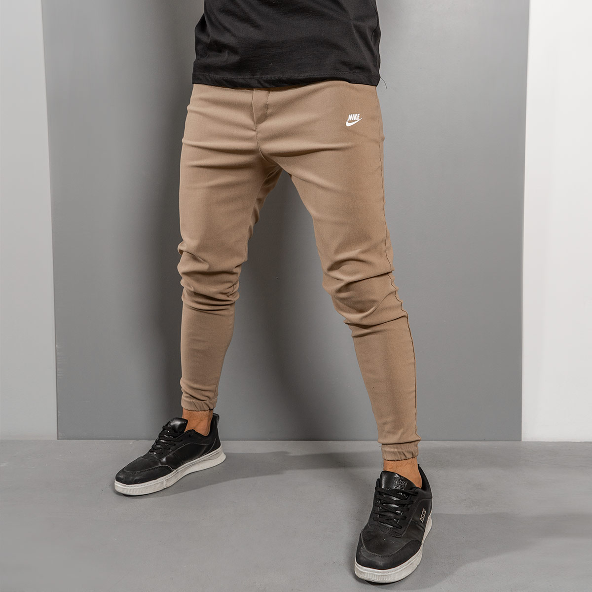 شلوار اسلش Nike کرم مردانه مدل Lango