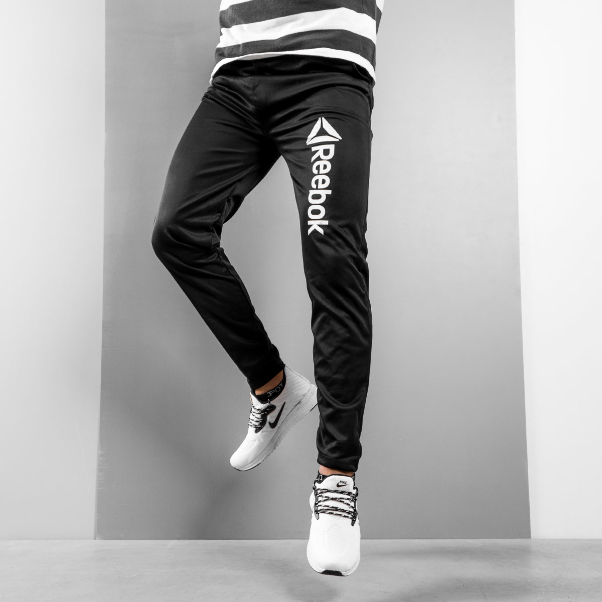 شلوار اسلش مردانه Reebok مدل FANTOM T