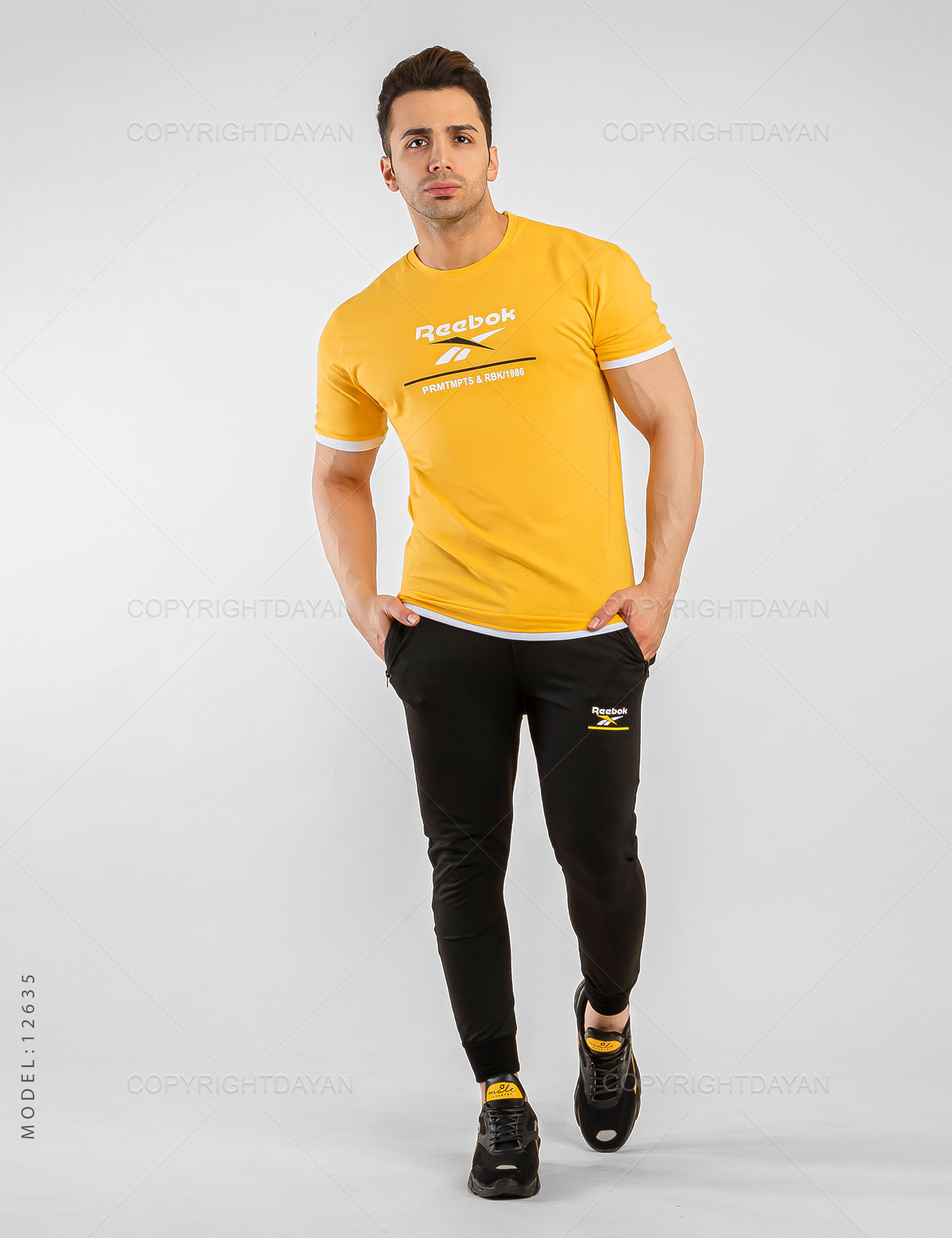 ست تیشرت شلوار مردانه Reebok مدل 12635
