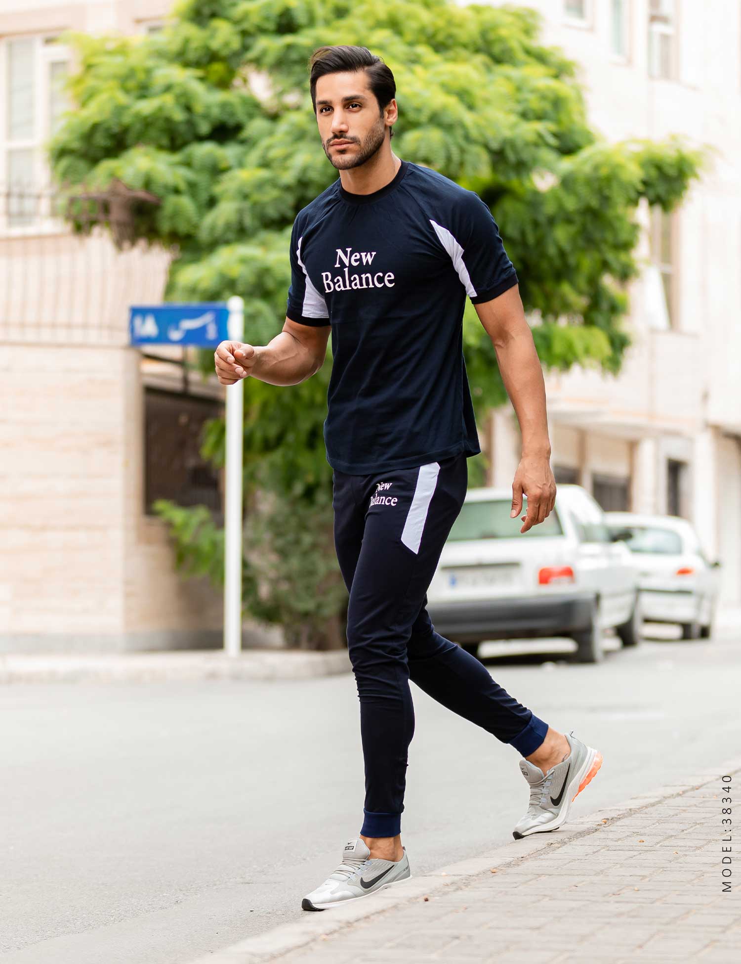 ست تیشرت شلوار مردانه New Balance مدل 38340
