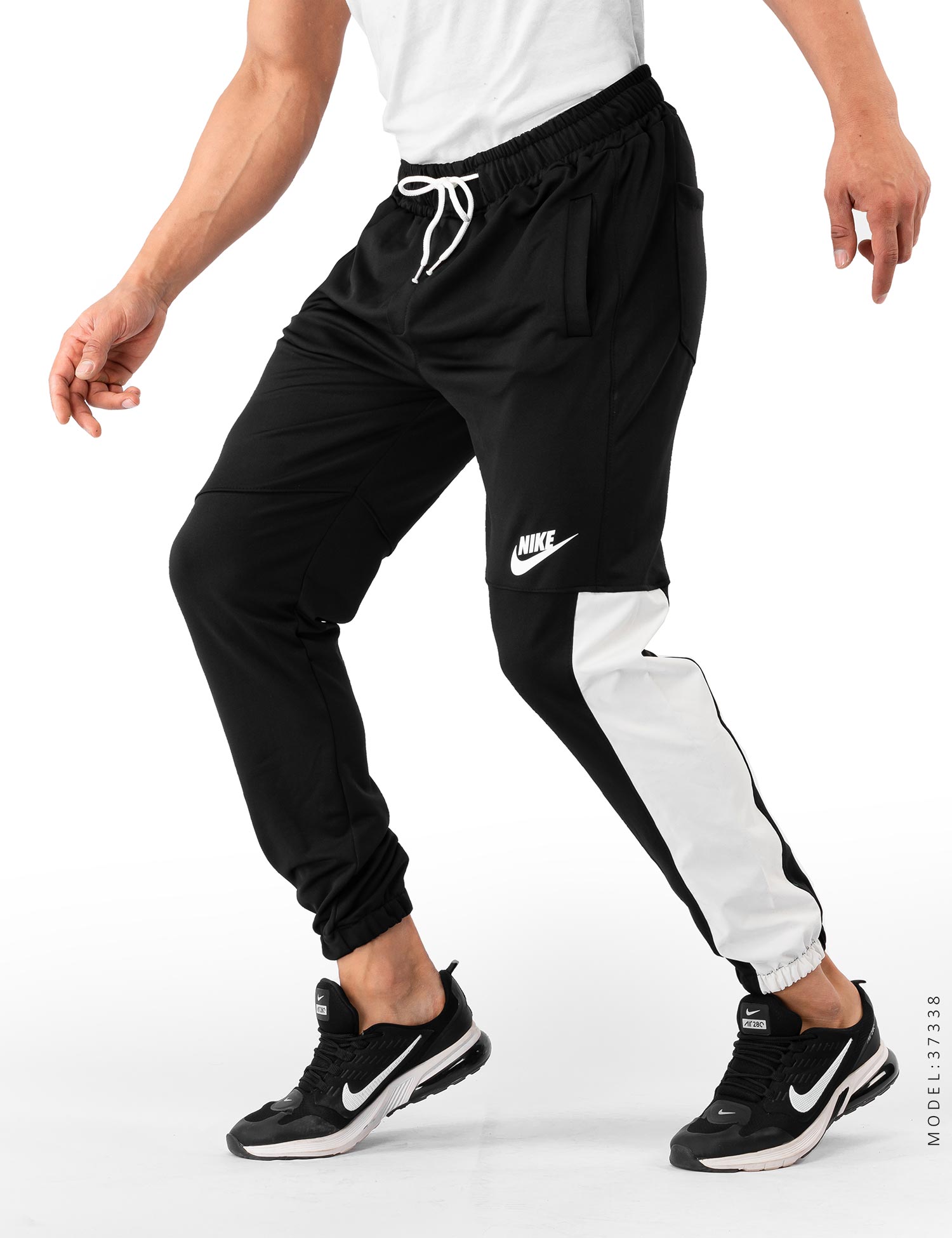 شلوار نیل اسلش مردانه مشکی راحتی Nike مدل 37338