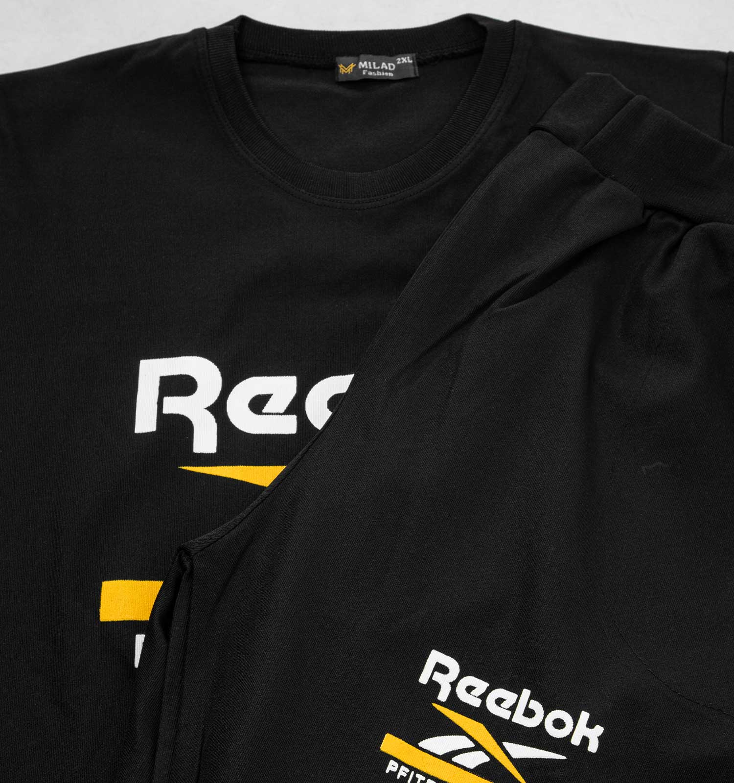 ست تیشرت شلوار مردانه Reebok مدل 36156