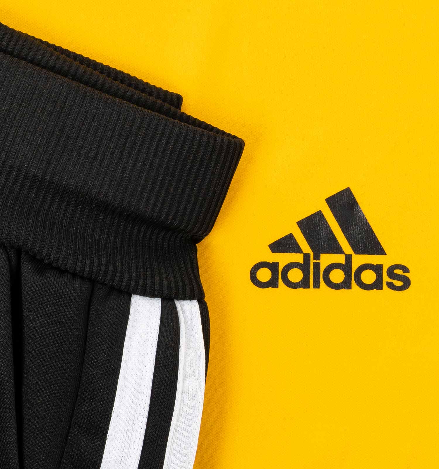 ست تیشرت شلوار مردانه آستین کوتاه زرد Adidas ساده یقه گردمدل 44176