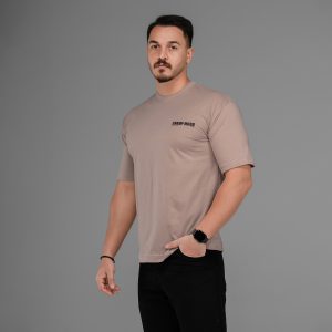 تیشرت باکسی مچینست ماکان یقه گرد مردانه کرمی طرحدار مدل 47567