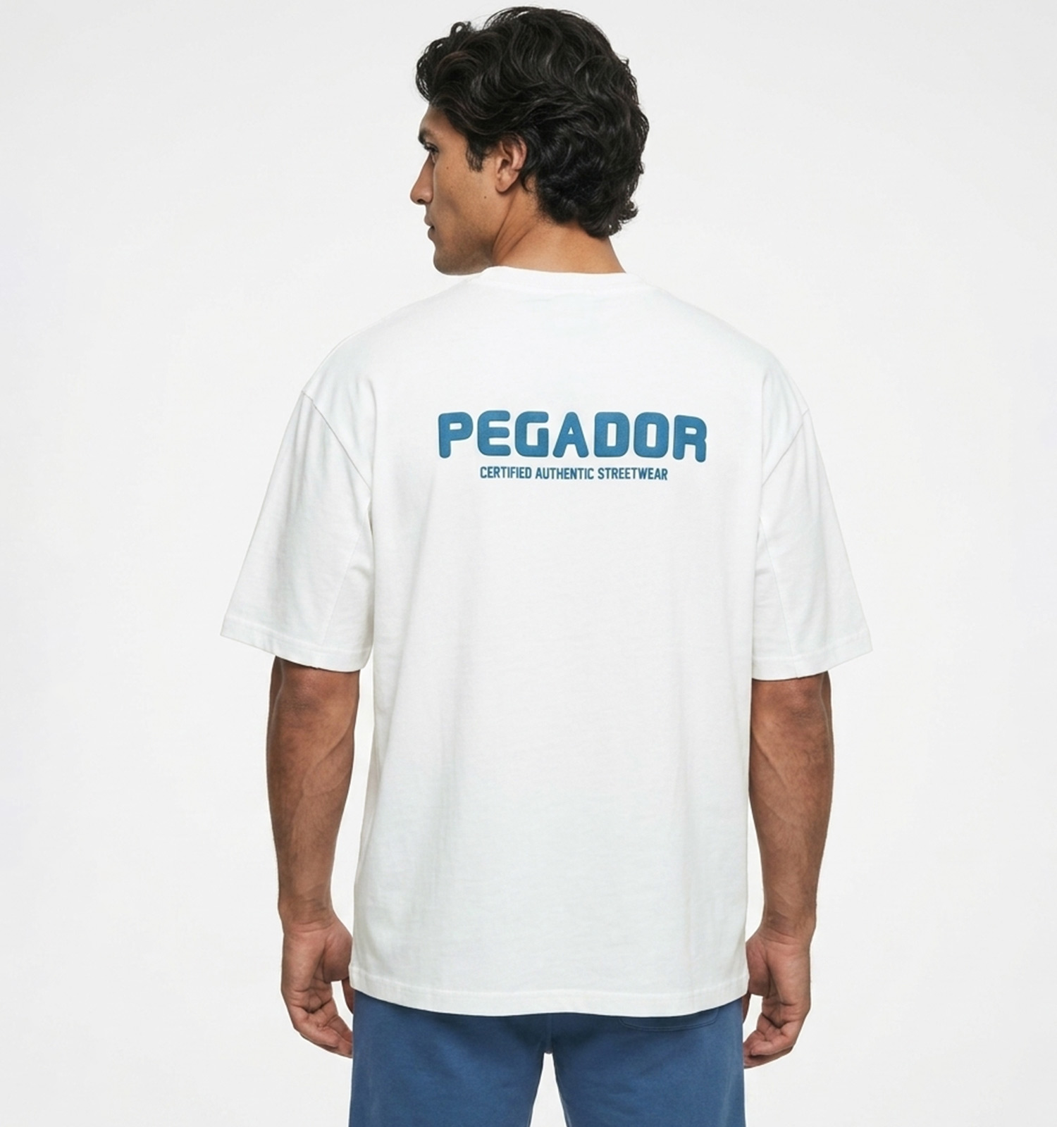 تیشرت Pegador یقه گرد مردانه باکسی سفید دورس پنبه طرحدار مدل 50123