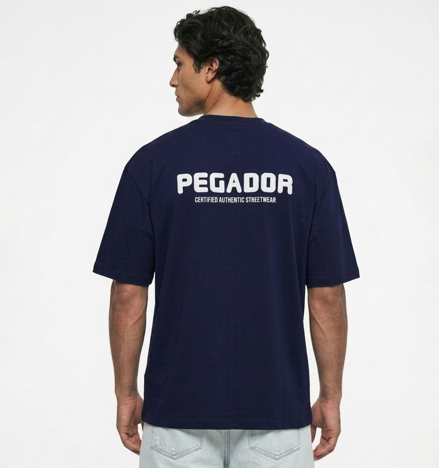 تیشرت Pegador یقه گرد مردانه باکسی سرمه ای دورس پنبه طرحدار مدل 50118