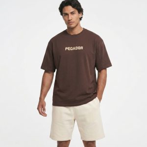 تیشرت Pegador یقه گرد مردانه باکسی دورس پنبه طرحدار مدل 50119