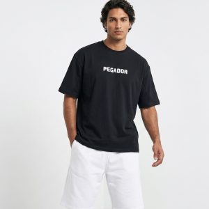 تیشرت Pegador یقه گرد مردانه باکسی مشکی دورس پنبه طرحدار مدل 50117