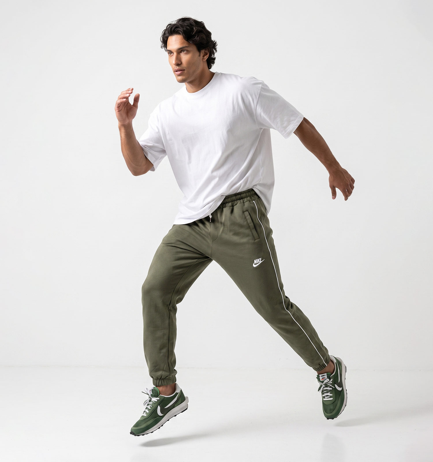 شلوار مردانه نیم بگ ساده بنگال سبز Nike مدل 50762