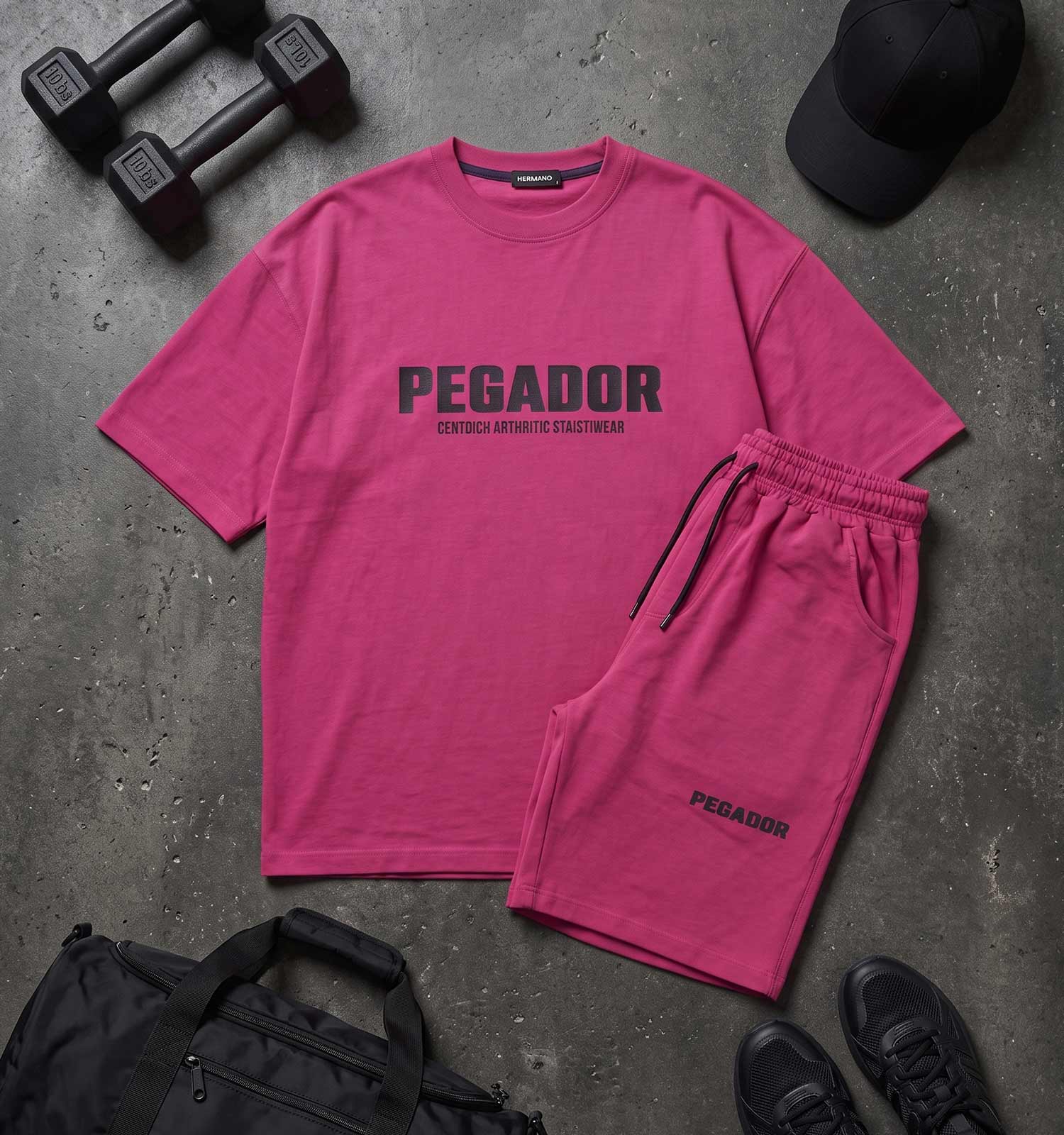 ست تیشرت شلوارک مردانه باکسی طرحدار مچینست صورتی Pegador مدل 50914